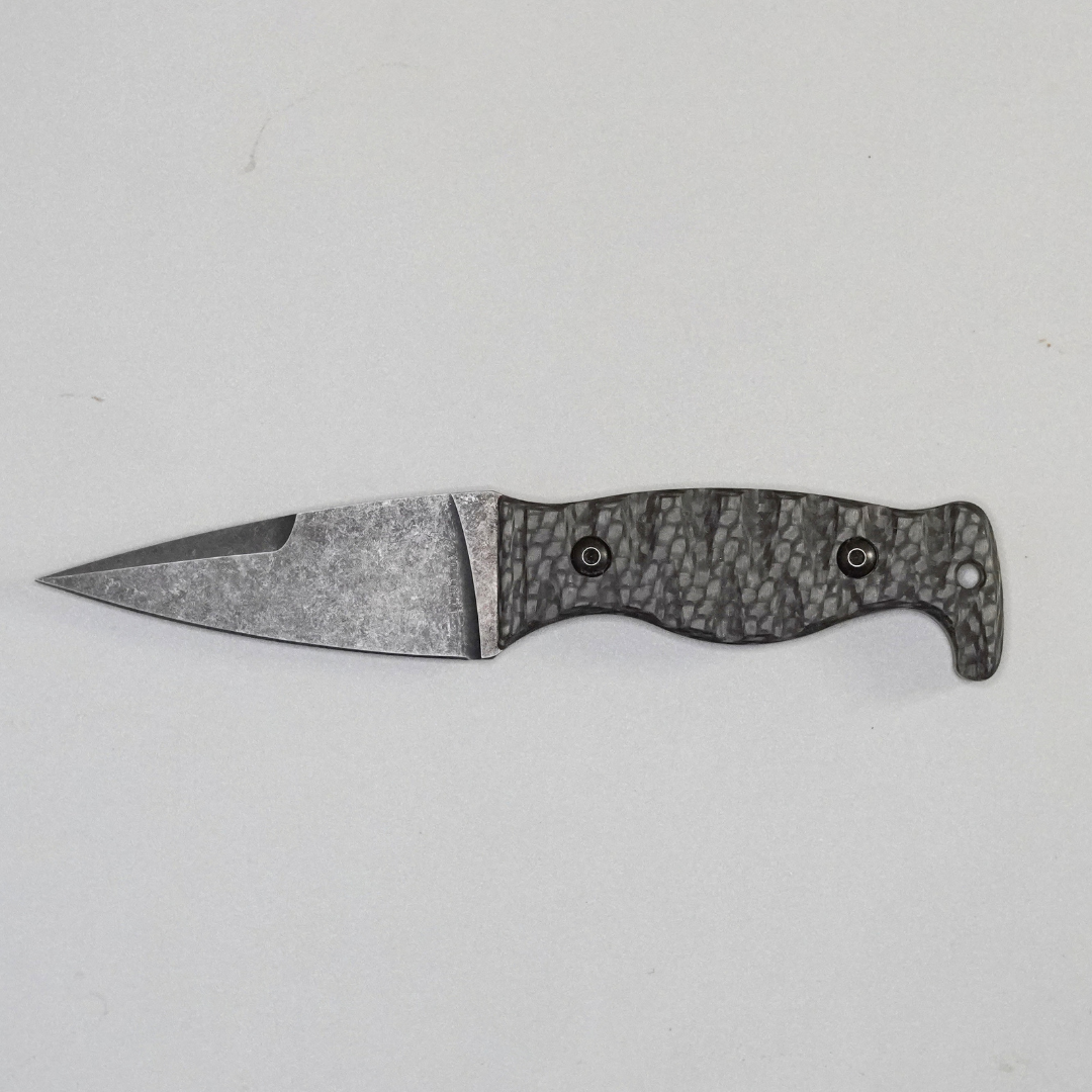 The Magnacut Custom NorthmanX (Non-Serrated) Carbon Fiber with Orange G10 Liners Handle 451