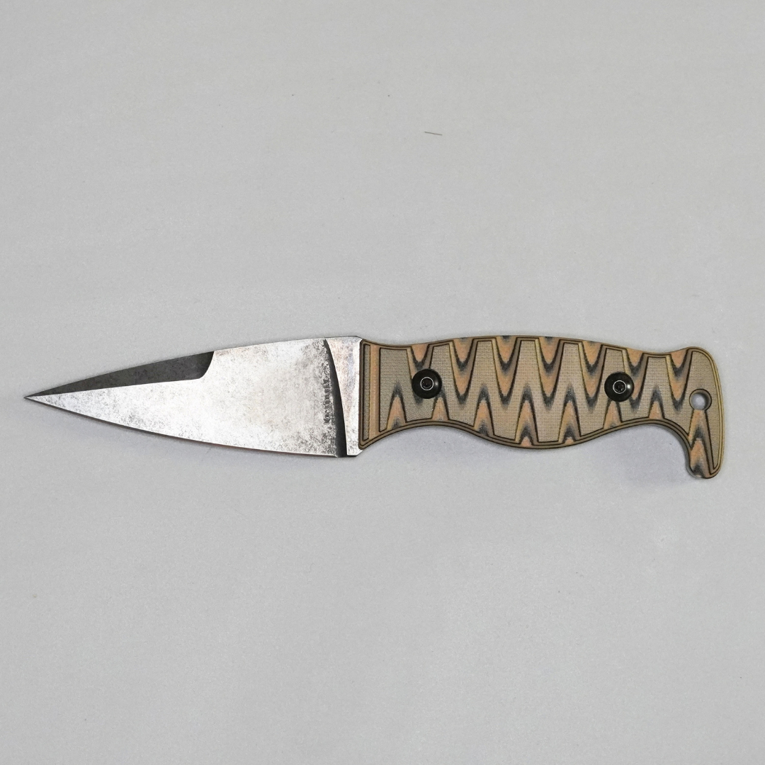 The Magnacut Custom NorthmanX (Non-Serrated) Desert Tan/Black G10 Handle 457